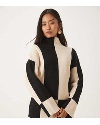 Pretty Lavish - Rib Knit Spliced High Neck Jumper - Lyst