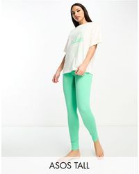 ASOS - Esclusiva asos design tall - pigiama color crema e verde con leggings e t-shirt oversize con stampa di fiore - Lyst