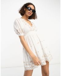 River Island - Robe courte en broderie anglaise - Lyst