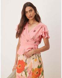Hope & Ivy - Ruffle Sleeve Embellished Wrap Top - Lyst