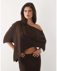 Missy Empire - Ribbed Knit Asymmetric Hem Cape Top - Lyst