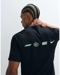 Nike - Stride Dri-fit Graphic Print T-shirt - Lyst