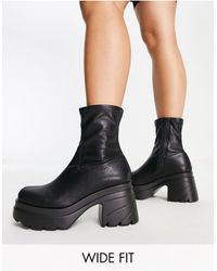 Truffle Collection - Botas negras estilo calcetín con tacón y suela gruesa - Lyst