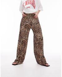TOPSHOP - Pantaloni plissé con stampa leopardata - Lyst