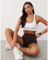 4505 - Seamless Baby Rib Racer Back Sports Bra With Adjustable Strap - Lyst