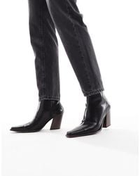 ASOS - Bottines chelsea à talon en cuir avec semelle naturelle - Lyst