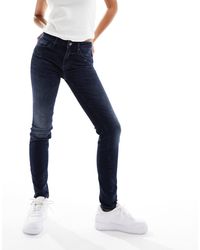 ARMANI EXCHANGE - Jean super skinny push-up à taille mi-haute - bleu foncé - Lyst