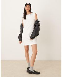 Calvin Klein - Vestido Corto Con Cuello Alto Y Mangas De Casquillo De - Lyst