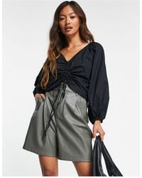 Blusas Mango de mujer: hasta el 40 % de descuento | Lyst
