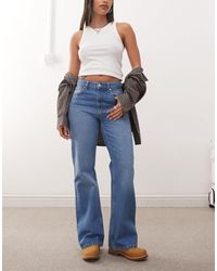 Reclaimed (vintage) - – locker geschnittene, ausgestellte bootcut-jeans - Lyst