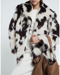 River Island - – mantel aus kunstpelz mit kuhfellmuster - Lyst