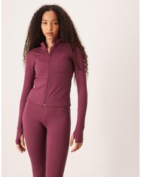 4505 - Top Deportivo Burdeos De Manga Larga Con Cremallera De Tejido Suave Icon De -Morado - Lyst
