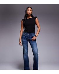 ASOS - Vaqueros De Corte Bootcut Con Lavado Medio Oscuro De Asos Design Petite-Azul - Lyst