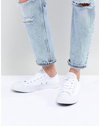 white monochrome low top converse