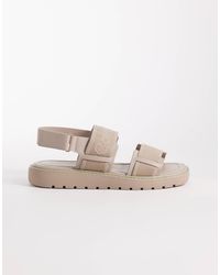 Calvin Klein - Jeans - sandales à bout carré avec brides en toile et grand logo - beige - Lyst