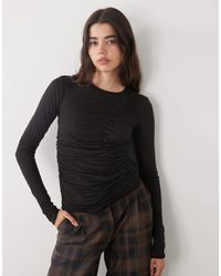 Monki - – transparentes slim fit oberteil - Lyst
