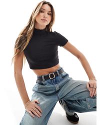 ONLY - High Neck Half Zip Crop Top - Lyst
