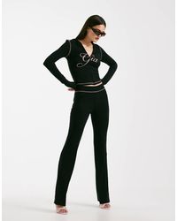 I.AM.GIA - Blare Logo Back Print Contrast Stitch Track Pants - Lyst