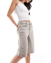 ASOS - Short en jean long coupe baggy à délavage teinté - Lyst