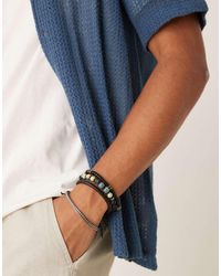 ASOS - Confezione Da 4 Bracciali Da Festival Con Catenina E Perline Neri - Lyst