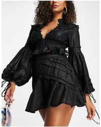 ASOS Mini-jupe plissée à ourlet volanté (pièce d'ensemble) - Noir