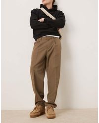 ASOS - Pantalones De Vestir Caquis De Corte Tapered Extragrande Con Pinzas De -Verde - Lyst