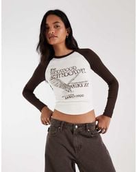 Hollister - Graphic Fitted Long Sleeve Raglan T-Shirt - Lyst