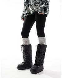 SEQWL - Botas De Nieve Negras Por La Rodilla De - Lyst