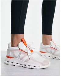On Shoes - On - cloudnova void - sneakers bianche e arancioni - Lyst