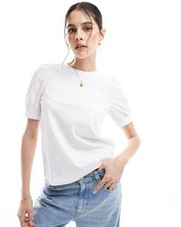 Vero Moda - Camiseta blanca con mangas abullonadas - Lyst