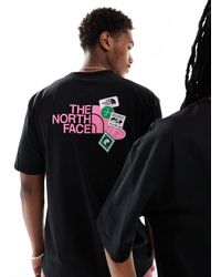 The North Face - Camiseta negra extragrande con estampado en la espalda expedition stickers exclusiva en asos - Lyst