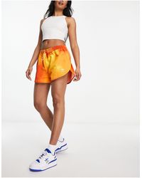 adidas Originals - Pantalones cortos naranjas estilo deportivo - Lyst