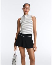 Oysho - Striped Half-zip Sleeveless T-shirt - Lyst
