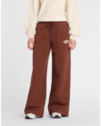 New Balance - Linear Heritage Fleece Wide Leg Pant - Lyst