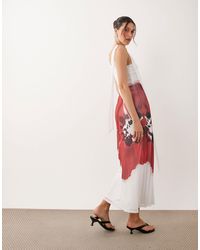 asos edition pearl placement midi dress ASOS EDITION pearl and fringe halter midi dress in hot pink