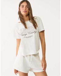 Stradivarius - T-Shirt Met Korte Mouwen En Newport-Print - Lyst