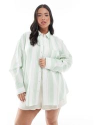 ASOS - Asos design curve – oversize-hemdbluse aus leinenmix mit breitem streifenmuster - Lyst