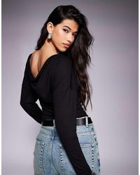 ASOS - Top Nero Extra Largo Con Scollo Ad Anello Sul Retro E Manica A Pipistrello Con Dettaglio Raccolto - Lyst