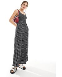 ASOS - Tuta Jumpsuit A Fondo Ampio Nera E Bianca A Pois Con Scollo Rotondo - Lyst