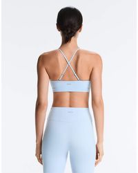 Oysho - Comfortlux Light-support Sports Bra With Crossover Straps - Lyst