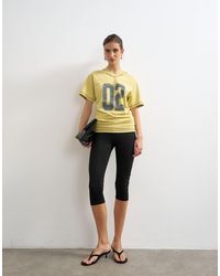 TOPSHOP - Micro V-neck Ruched Sides Graphic Tee - Lyst