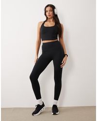 4505 - Thermal Running High Waist leggings With Zip Pocket - Lyst
