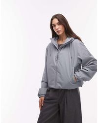 Rains - Chaqueta Corta Azul Claro Aislante Impermeable Con Capucha 15780 Lohja De - Lyst