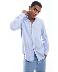 Polo Ralph Lauren - Camisa a rayas azules y blancas con logo - Lyst