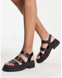 Schuh - Sandalias negras con suela gruesa - Lyst