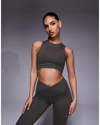 4505 - Icon High Neck Tank With Inner Bra - Lyst