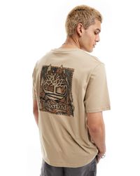 Timberland - T-shirt oversize beige con logo mimetico sul retro - Lyst