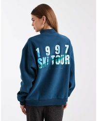 Cotton On - Zacht Sweatshirt Met Opstaande Hals En Ski Tour-Print - Lyst