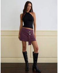 Motel - Yeri Low Rise Mini Skirt With Buckle Detailing - Lyst
