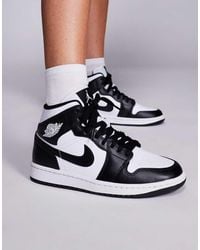 Nike - Zapatillas De Deporte Blancas Y Negras Air 1 Mid De Nike - Lyst